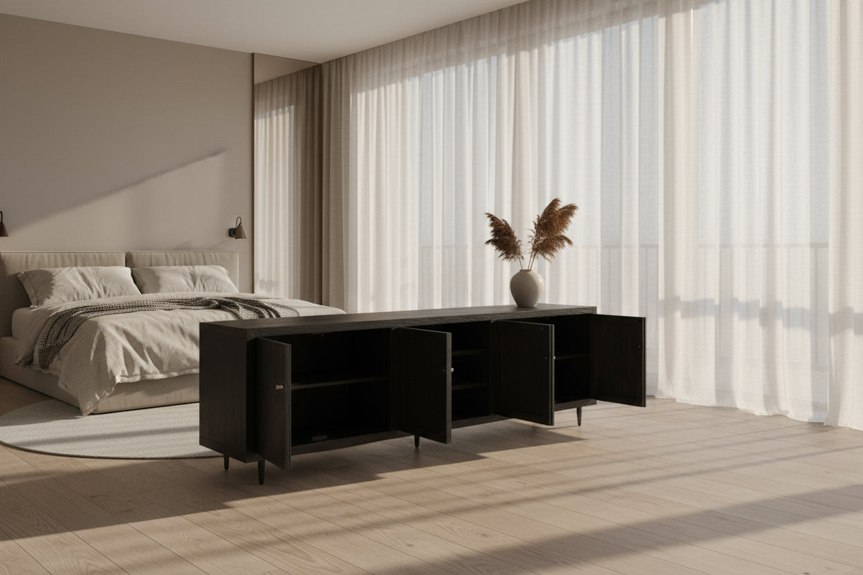 Dark wooden entertainment console with open doors on a white background