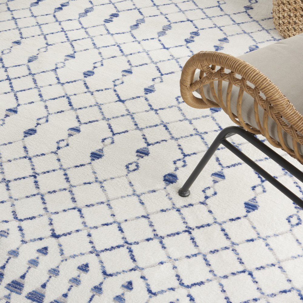 7' X 10' Ivory and Blue Geometric Distressed Non Skid Area Rug