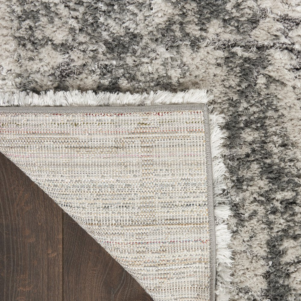 5' X 7' Charcoal and Ivory Abstract Shag Area Rug