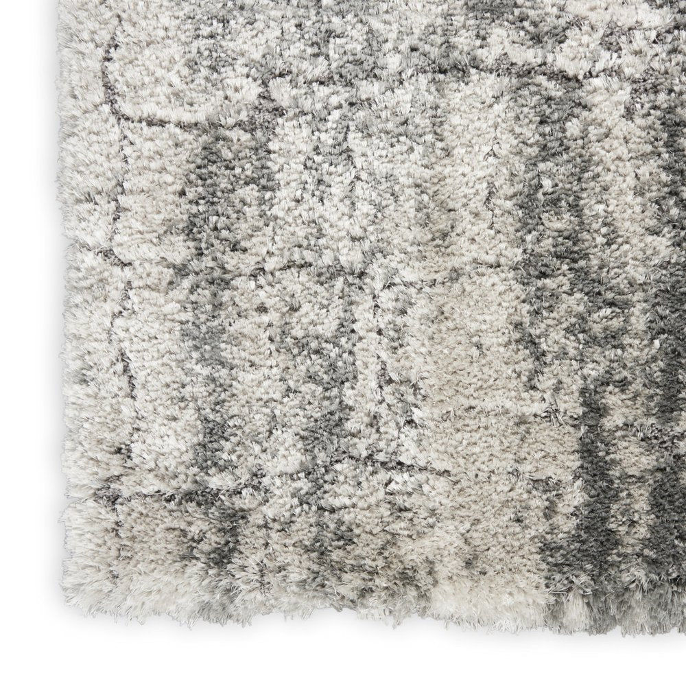 5' X 7' Charcoal and Ivory Abstract Shag Area Rug