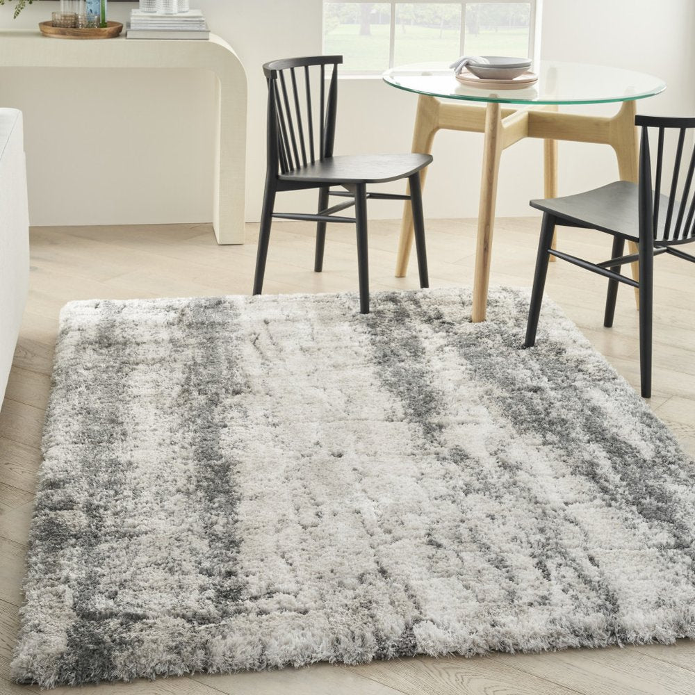 5' X 7' Charcoal and Ivory Abstract Shag Area Rug