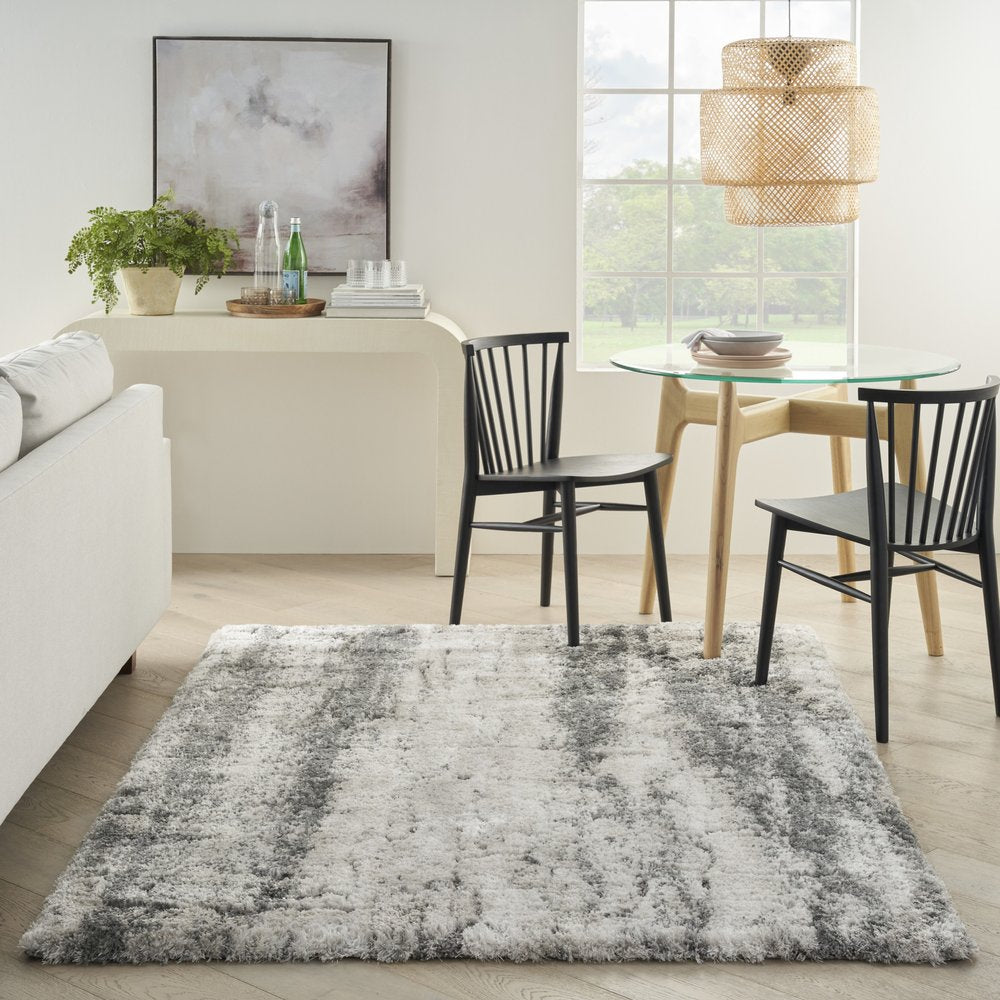 5' X 7' Charcoal and Ivory Abstract Shag Area Rug