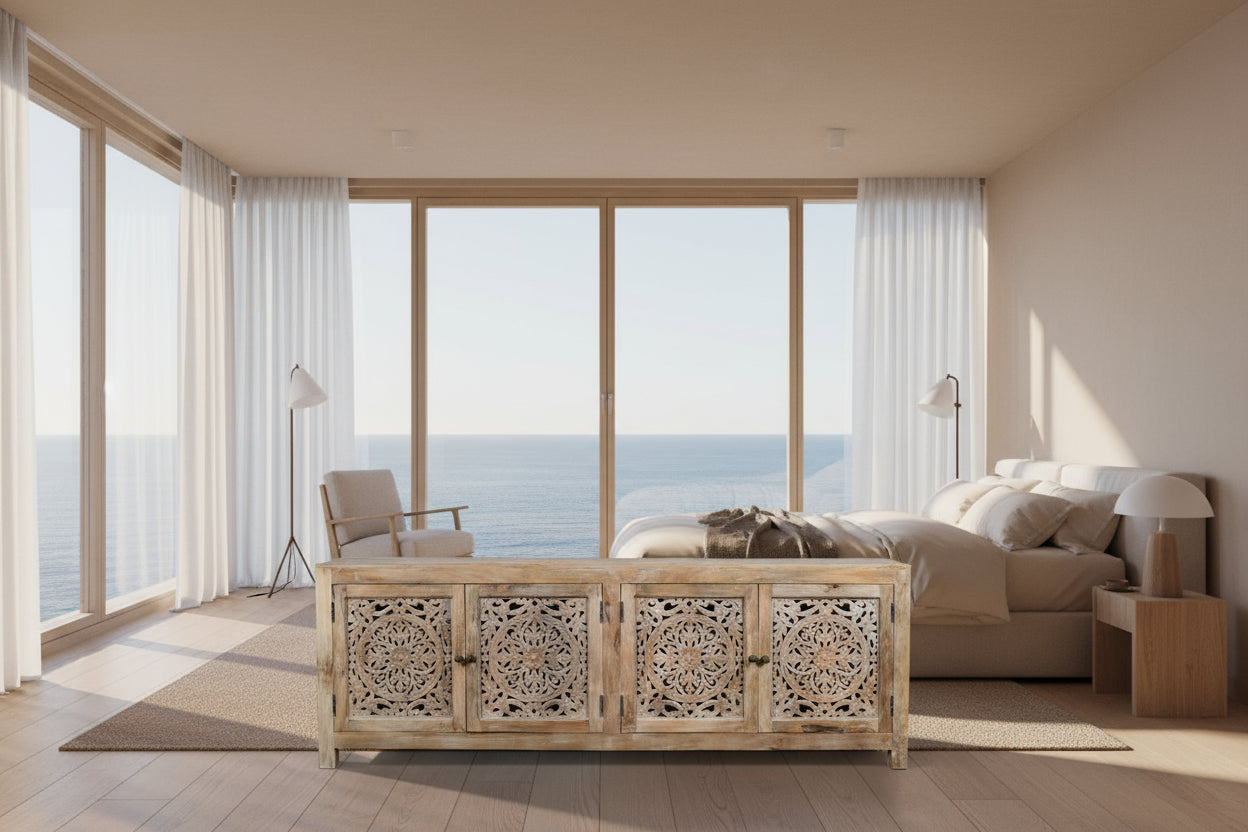 Wooden sideboard with intricate carvings on a white background