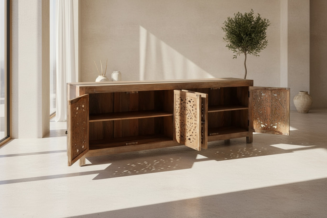 Wooden sideboard with open doors on a white background
