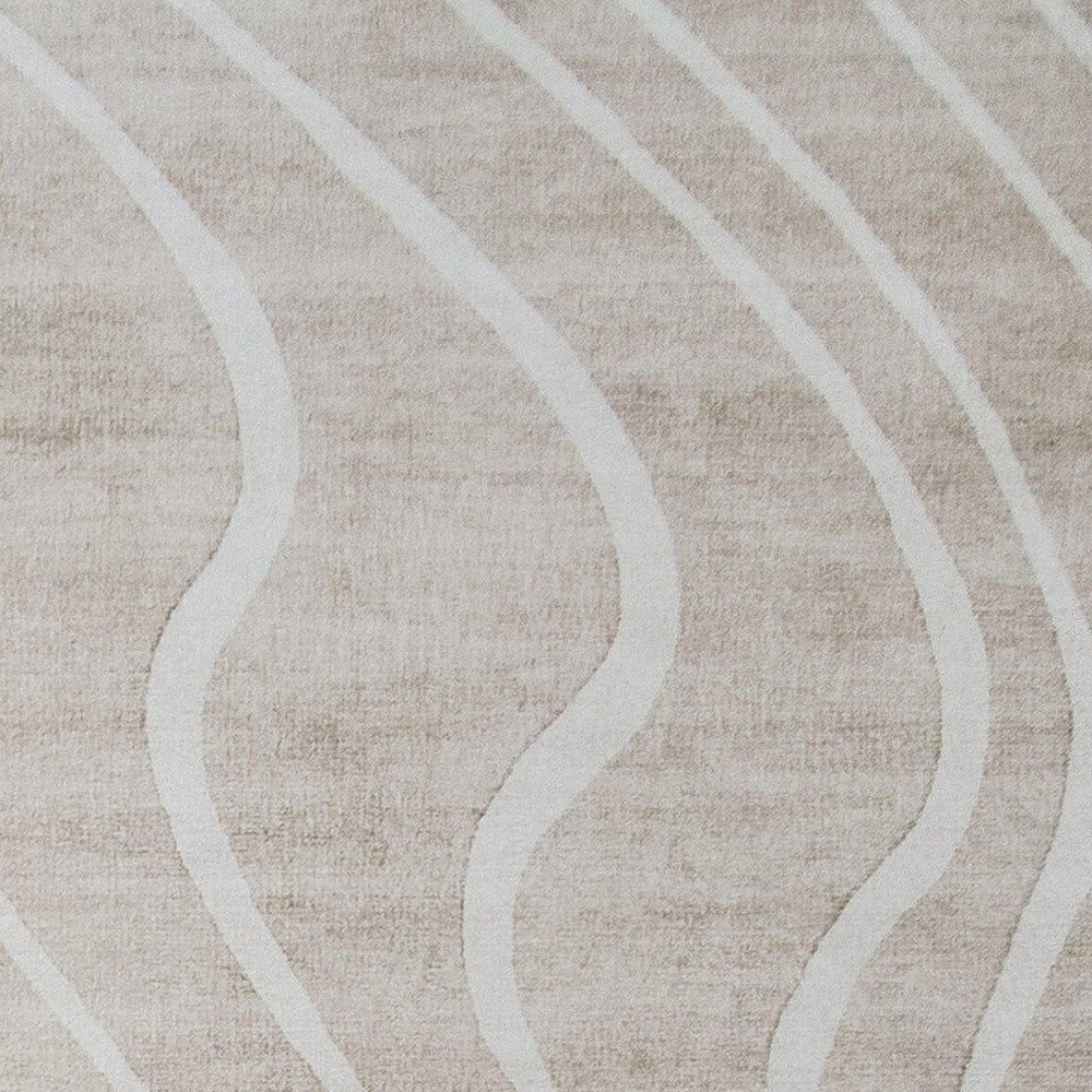 8' X 11' Beige and Ivory Abstract Distressed Area Rug