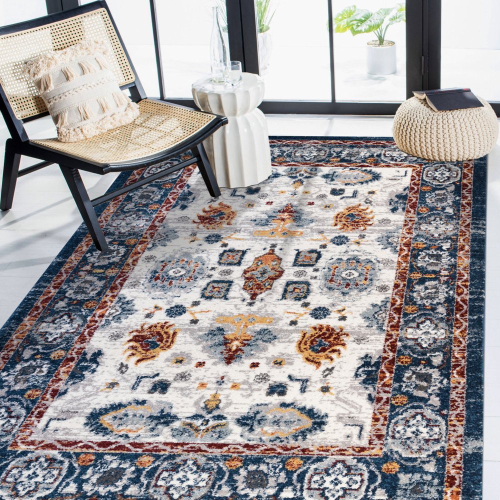 8' X 10' Ivory Navy and Orange Floral Power Loom Area Rug