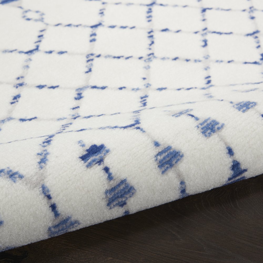 7' X 10' Ivory and Blue Geometric Distressed Non Skid Area Rug