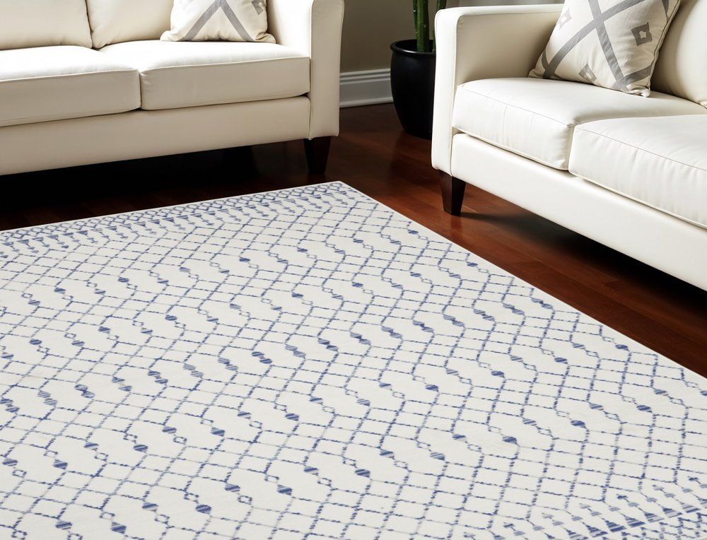 7' X 10' Ivory and Blue Geometric Distressed Non Skid Area Rug