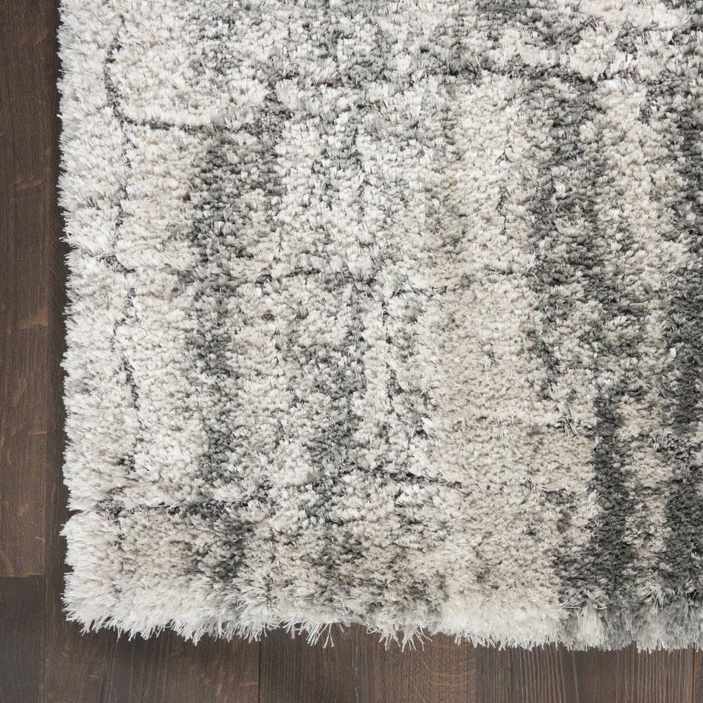5' X 7' Charcoal and Ivory Abstract Shag Area Rug