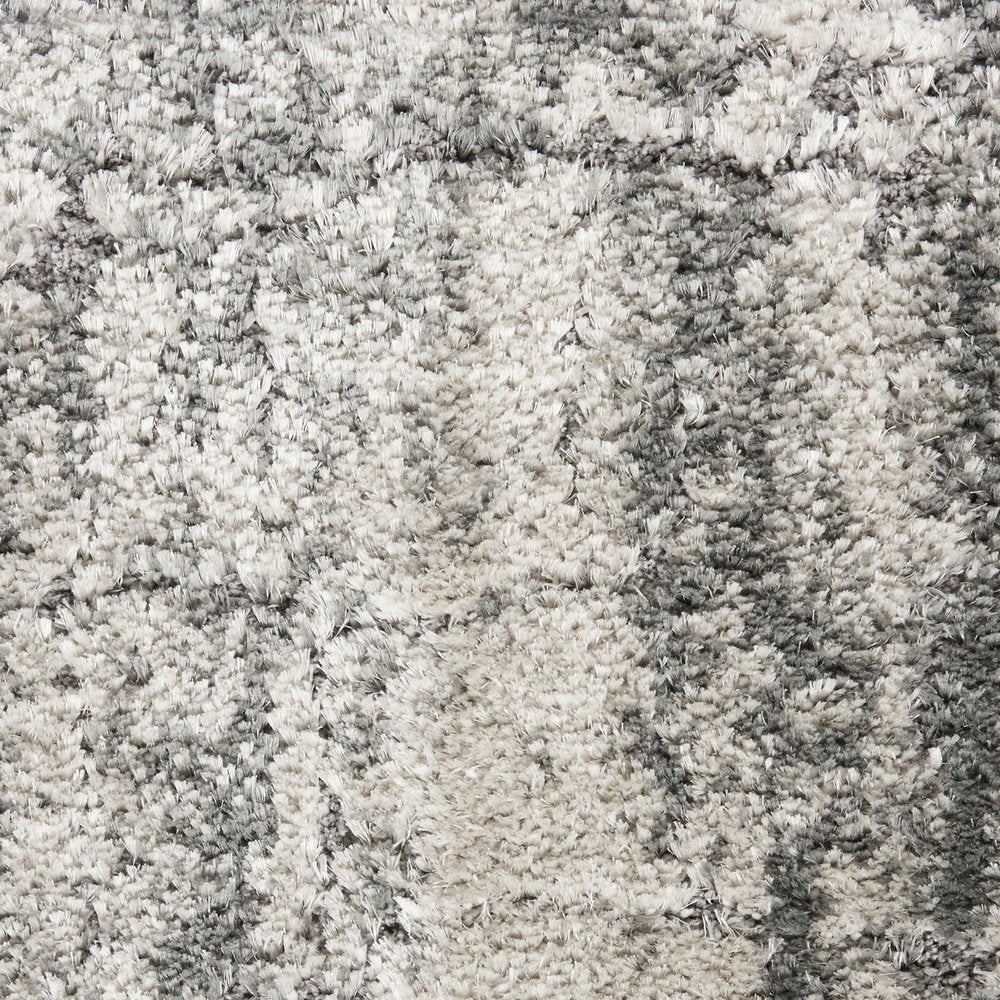 5' X 7' Charcoal and Ivory Abstract Shag Area Rug