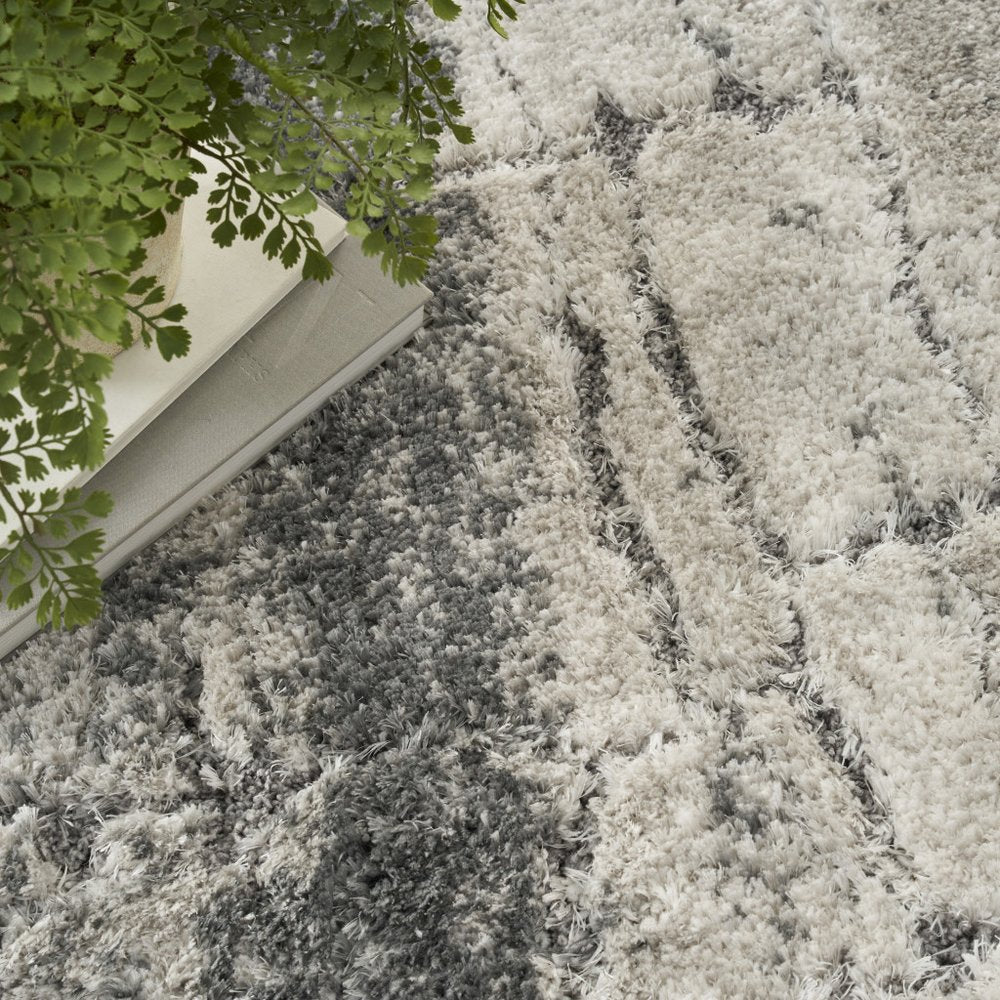 5' X 7' Charcoal and Ivory Abstract Shag Area Rug