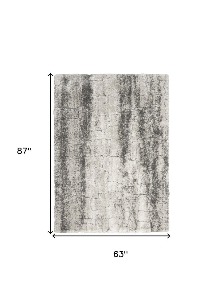 5' X 7' Charcoal and Ivory Abstract Shag Area Rug